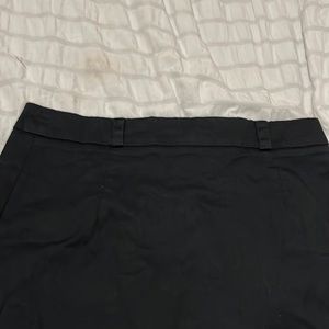 Black knee length skirt. Size is medium